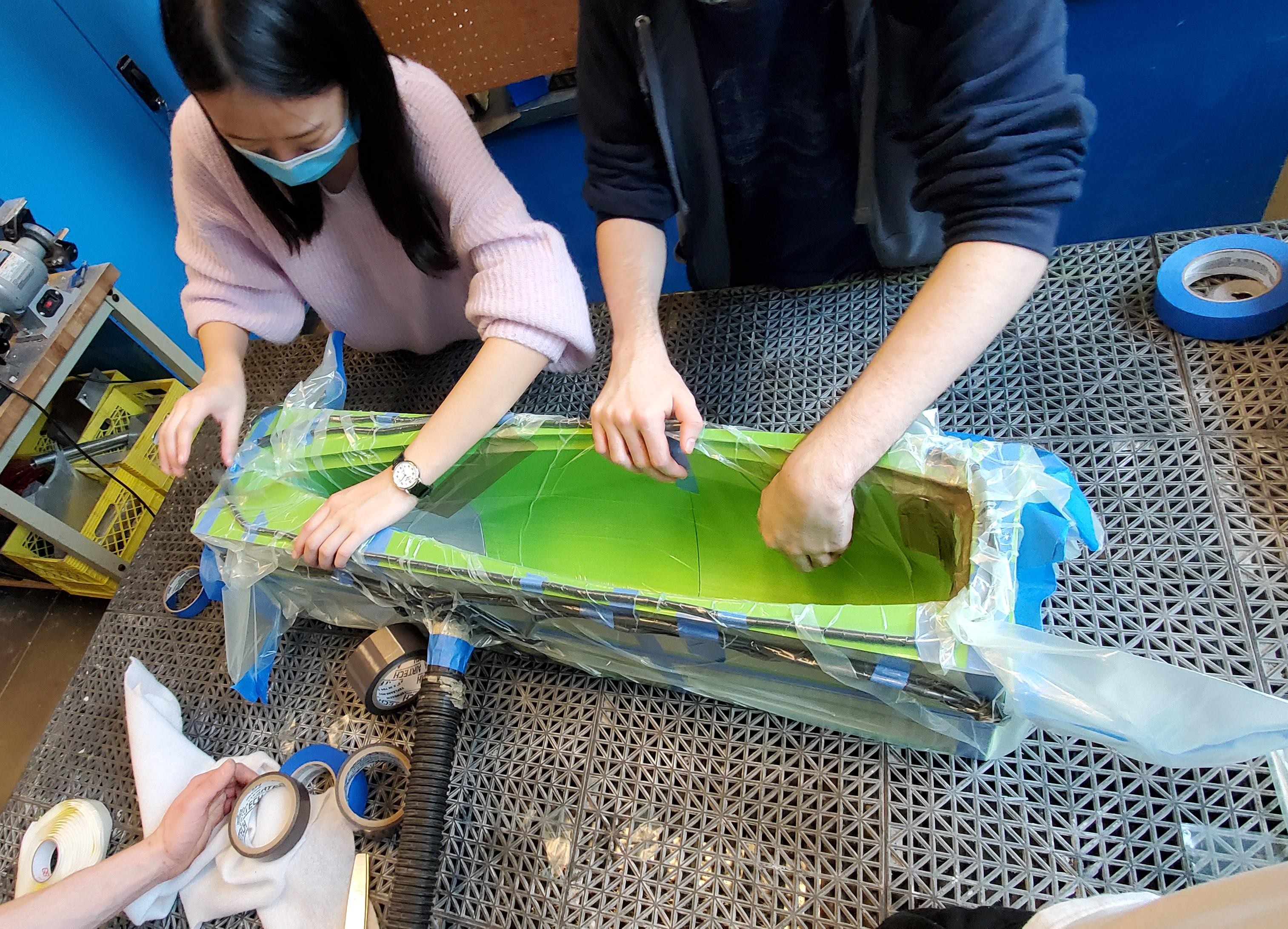 Fiberglass layup on catamaran hull